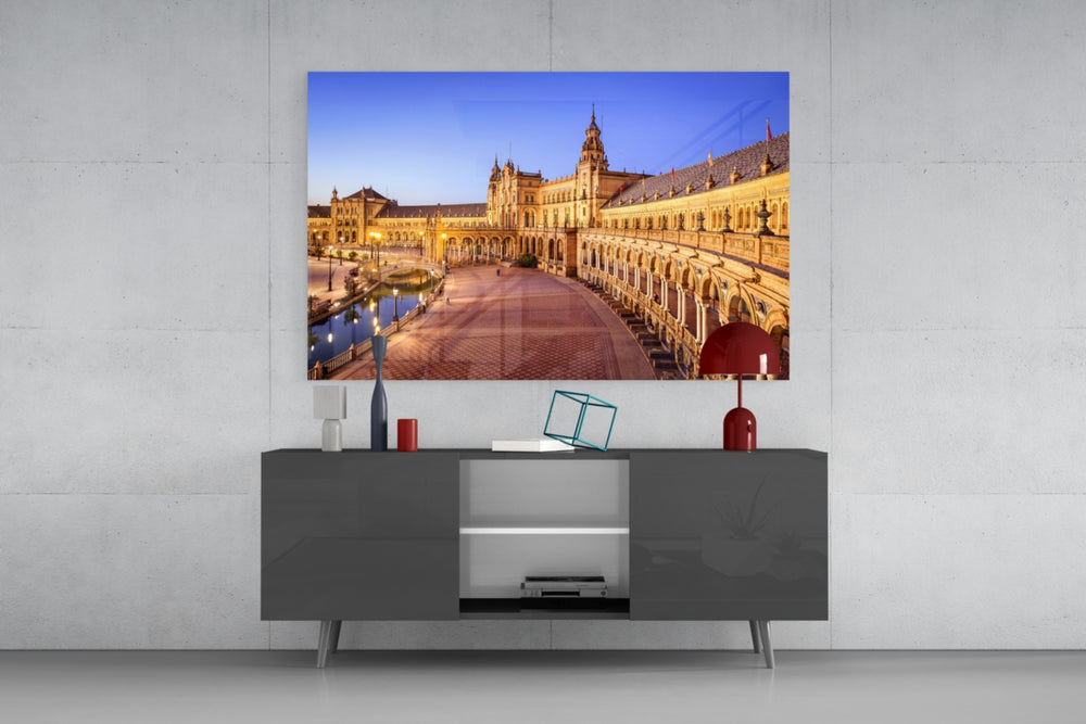 Sevilla glass wall art catching light to reveal its painted twilight tones