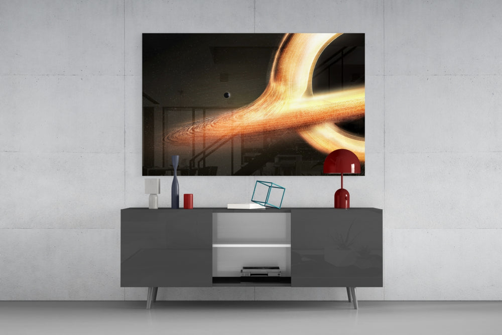 Space glass wall art catching light to reveal its painted gravitational lensing