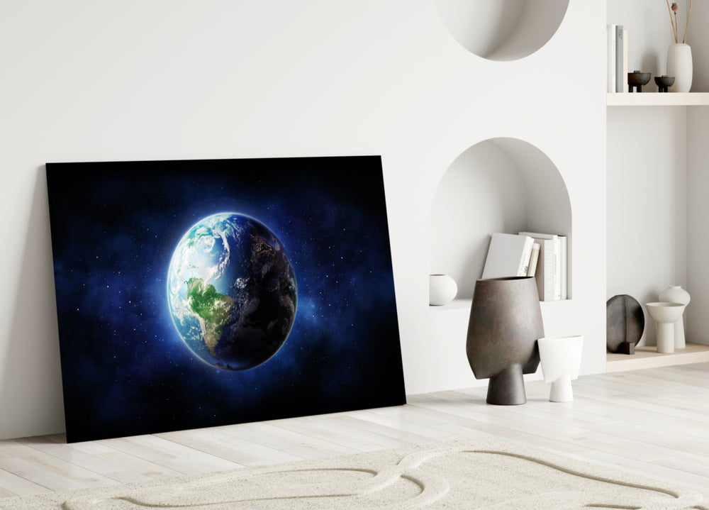 Close-up detail of Blue-Marble Earth and starfield behind glass