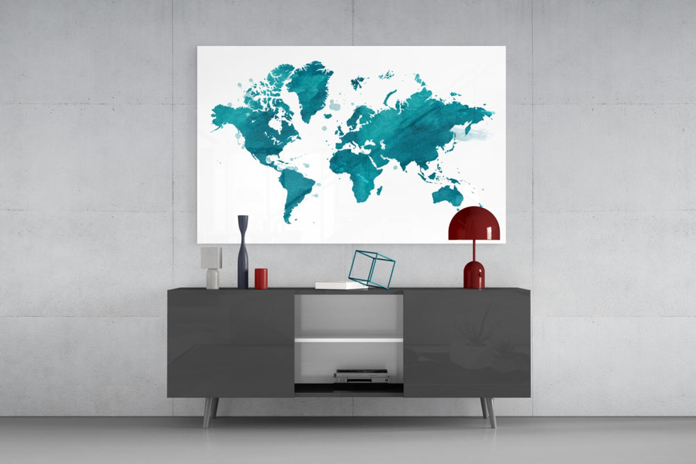 World Map glass wall art catching light to reveal its painted teal tones