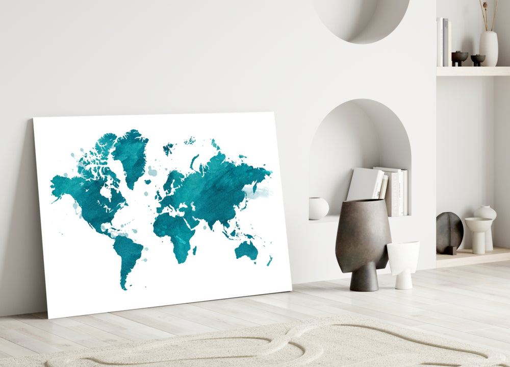 Close-up detail of teal watercolour continents behind glass