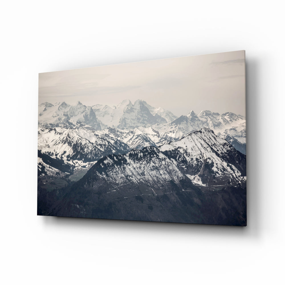 Snowy Mountains glass wall art in a modern living room