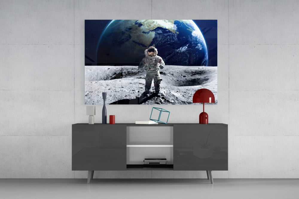Space Walk glass wall art catching light to reveal its painted Earth-rise