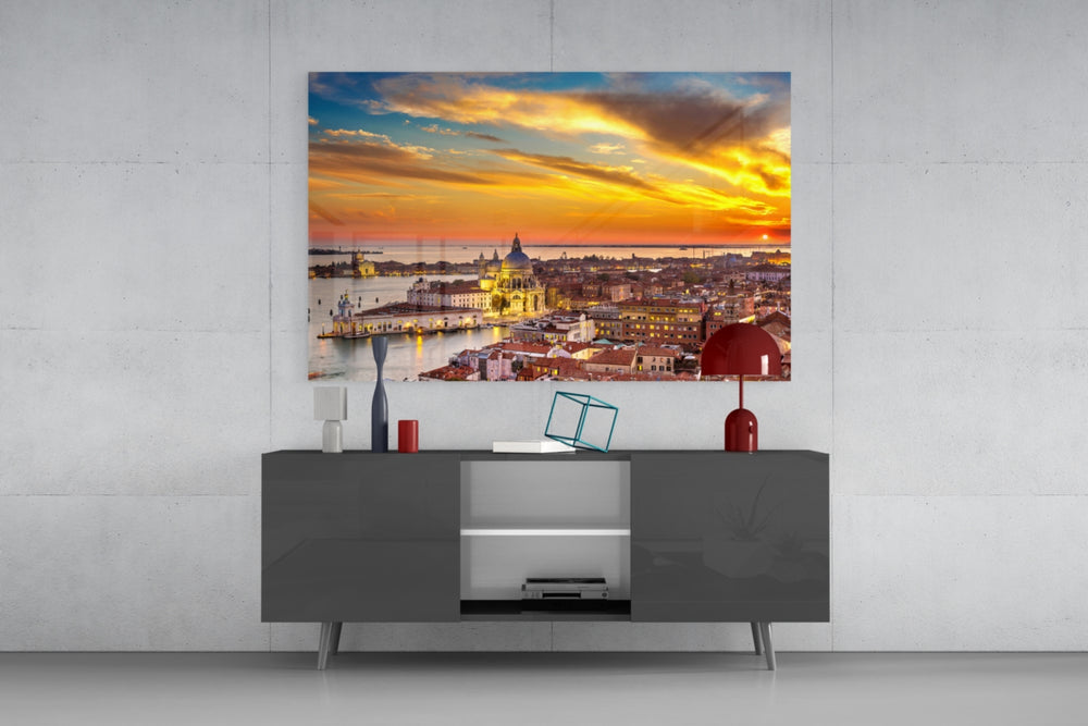 Sunset in Venice glass wall art catching light to reveal its painted amber sky