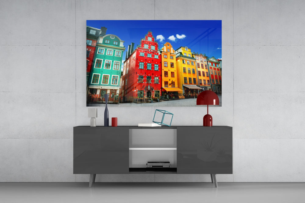 Stockholm House View glass wall art catching light to reveal its painted gabled tones