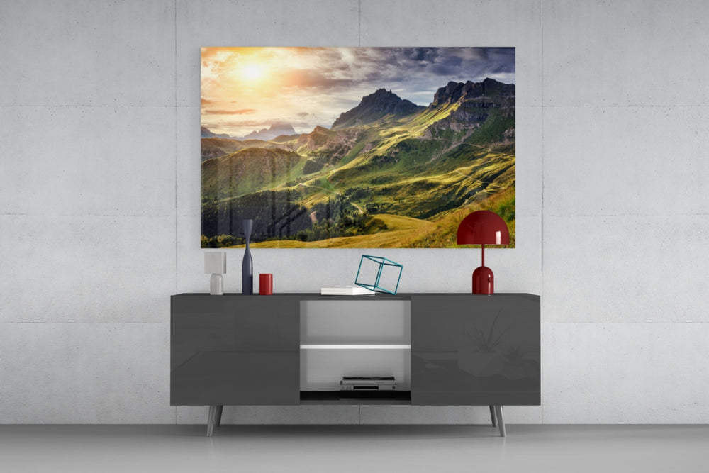 Mountain View glass wall art catching light to reveal its painted golden ridges