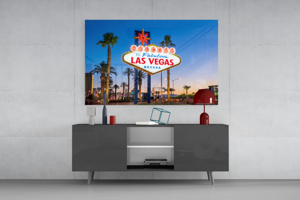 Vegas glass wall art catching light to reveal its painted neon tones