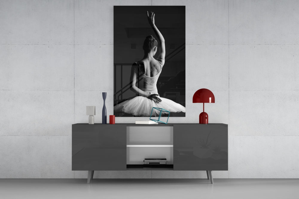 Ballerina glass wall art catching light to reveal its painted ivory tutu
