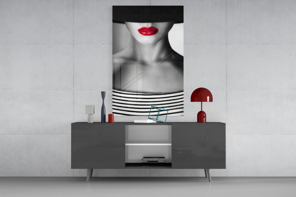 Red Lips Portrait glass wall art catching light to reveal its painted crimson