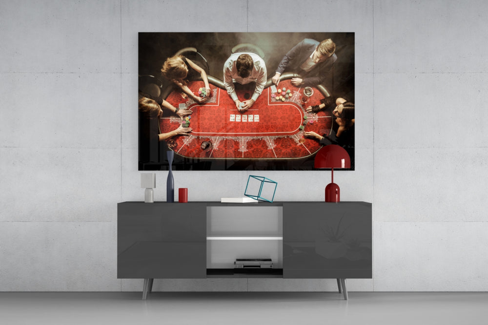 Gambling glass wall art catching light to reveal its painted scarlet felt