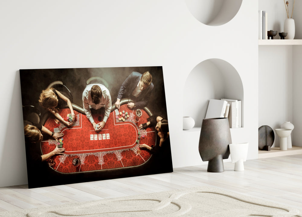 Close-up detail of red felt and chip stacks behind glass