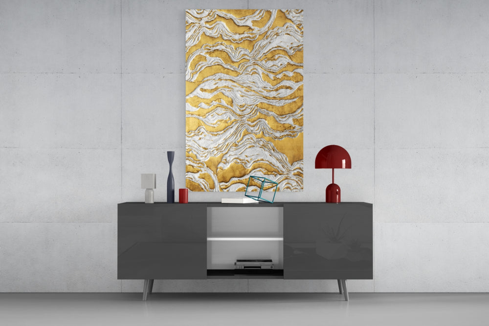 Golden Waves glass wall art catching light to reveal its painted gilded ground