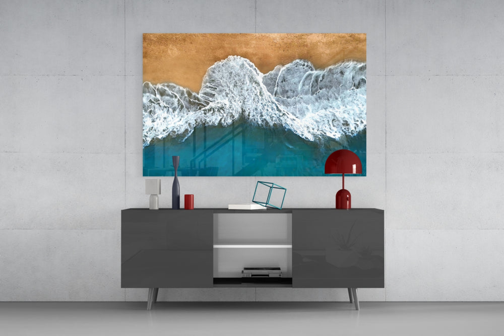 Waves glass wall art catching light to reveal its painted shoreline tones