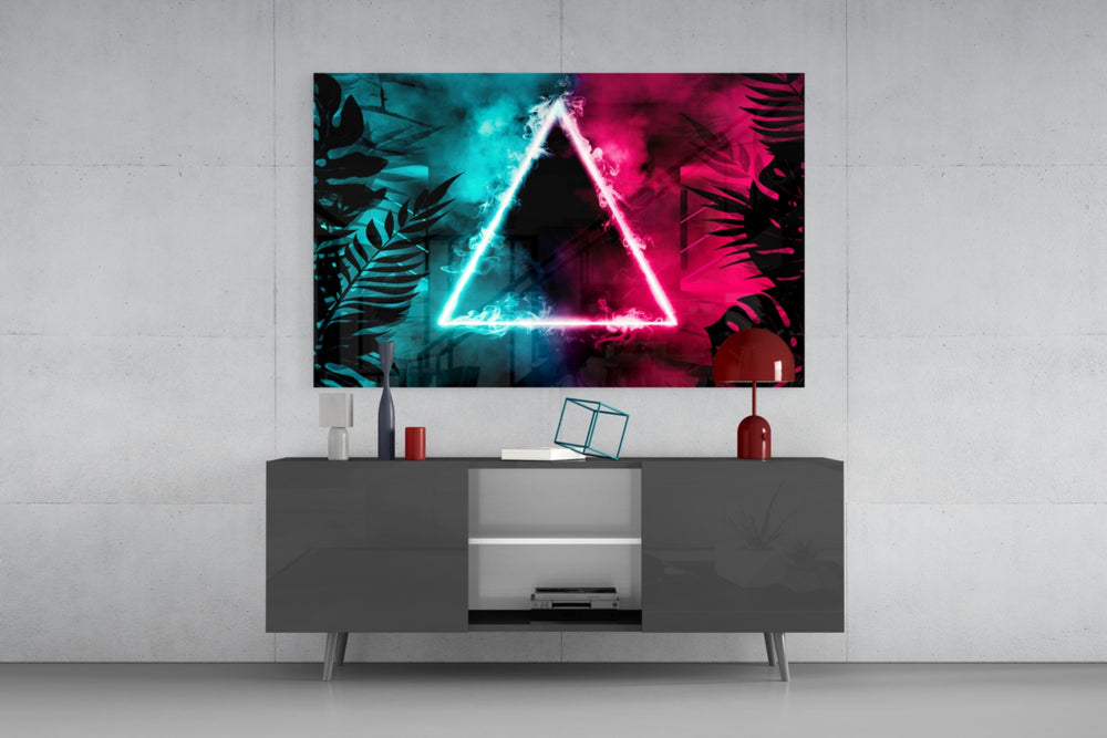 Abstract Art glass wall art catching light to reveal its painted neon triangle