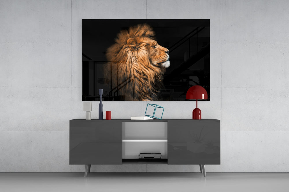 Lion glass wall art catching light to reveal its painted amber mane