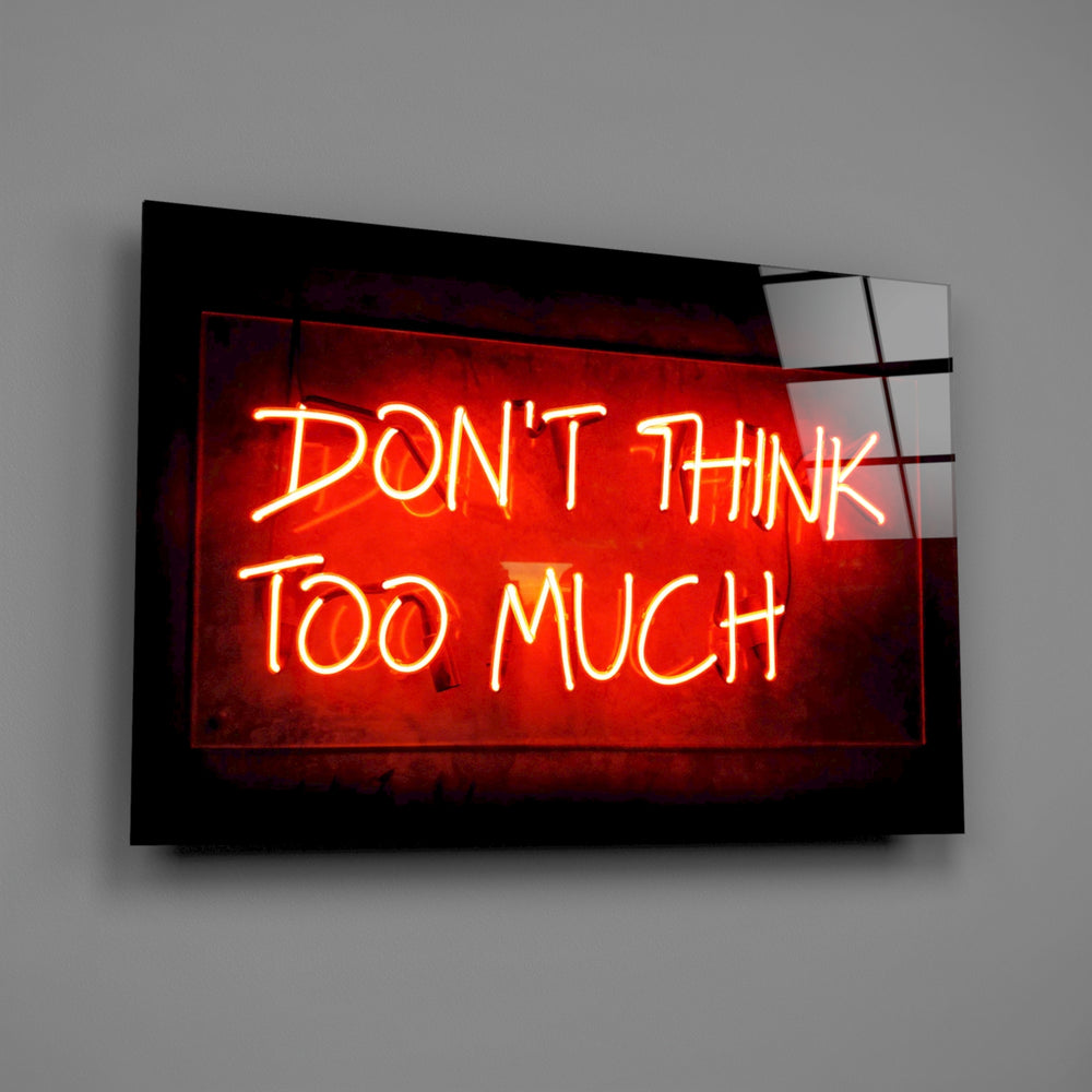 Neon mantra panel anchoring a studio wall