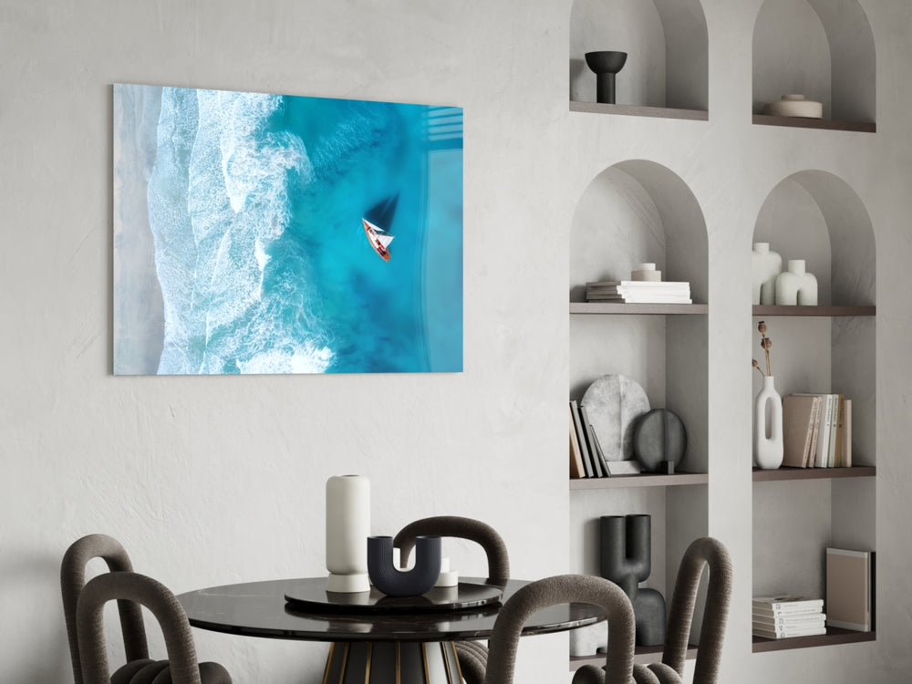 Cinematic coastal print bringing aerial edge to a coastal-themed bedroom