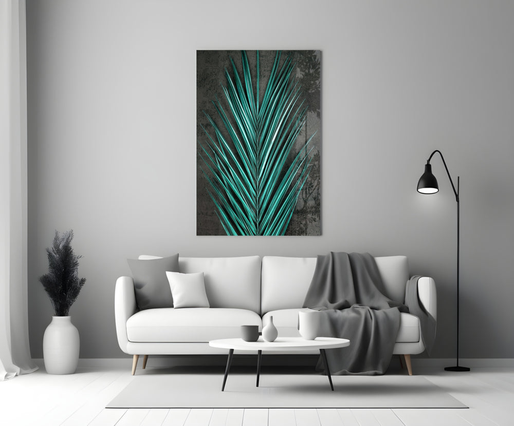 Close-up detail of teal palm-frond leaflets behind glass