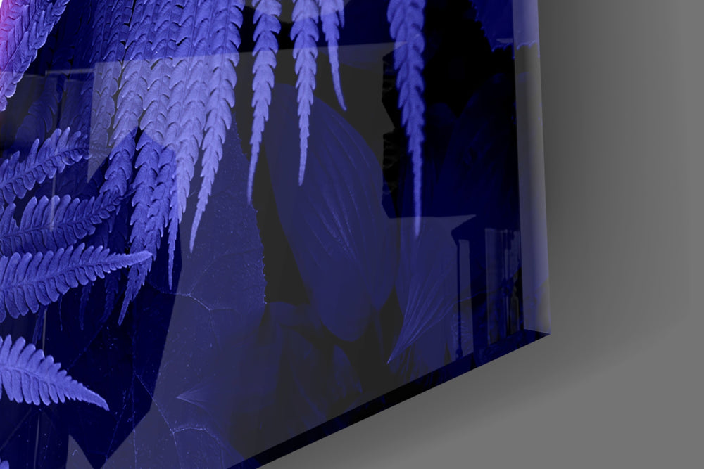 Abstract Art glass wall art catching light to reveal its painted neon jungle