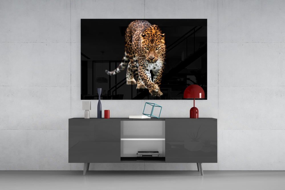 Tiger glass wall art catching light to reveal its painted amber coat