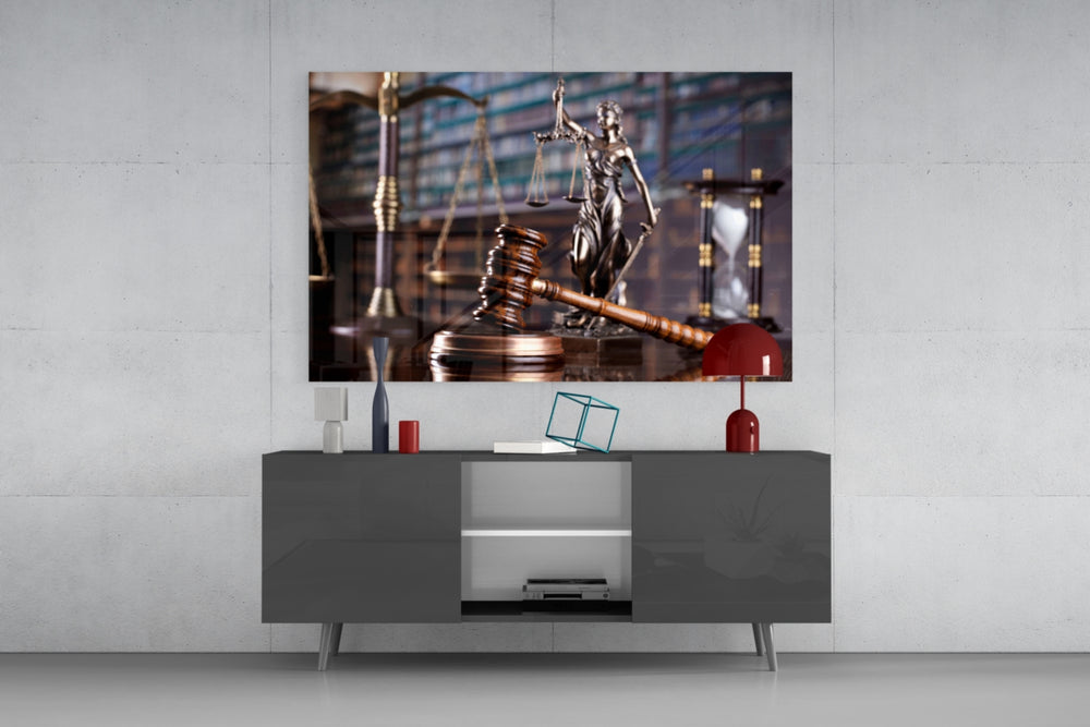 Gavel Of Justice glass wall art catching light to reveal its painted bronze tones