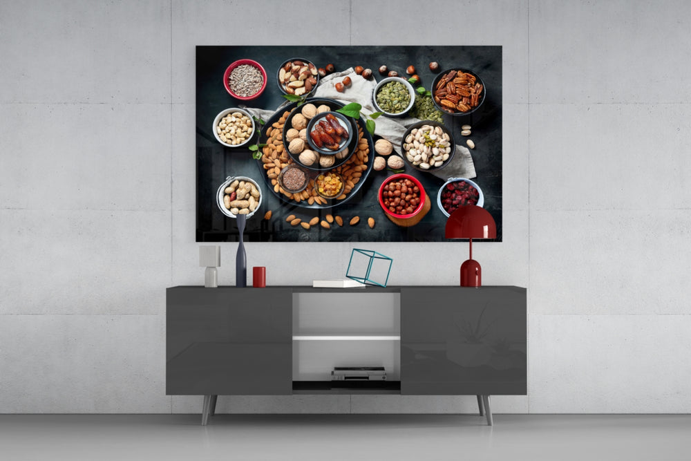 Nuts glass wall art catching light to reveal its painted pantry tones