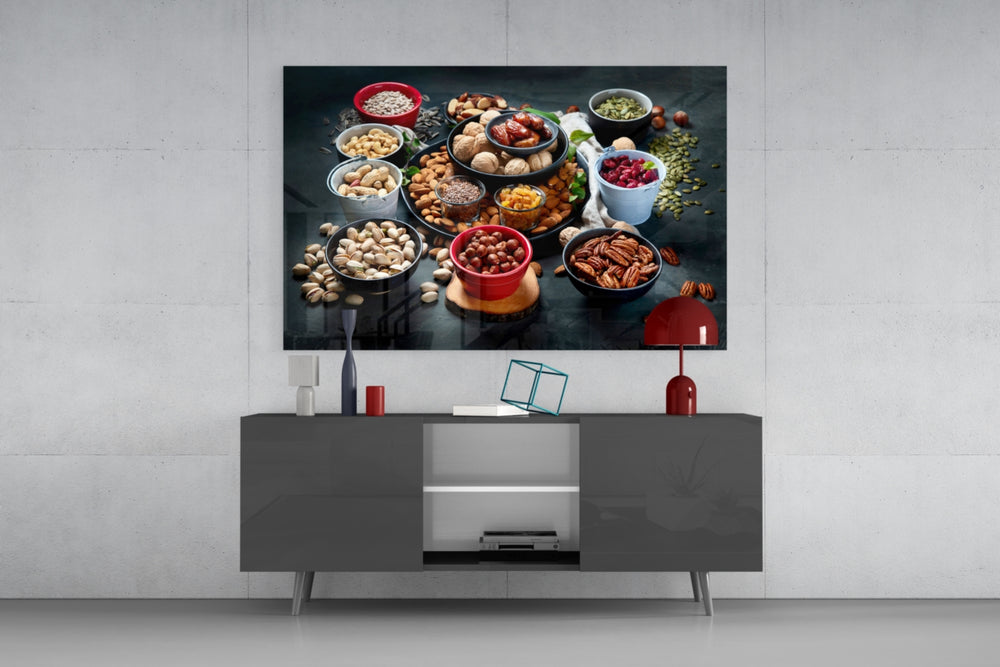 Nuts glass wall art catching light to reveal its painted pantry tones