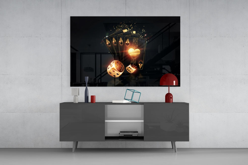Gambler's Guns glass wall art catching light to reveal its painted gold tones