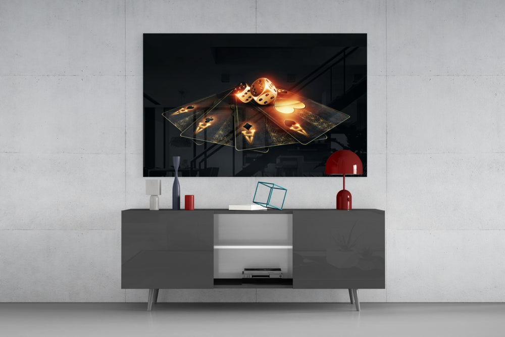 Gambler's Guns glass wall art catching light to reveal its painted gold tones