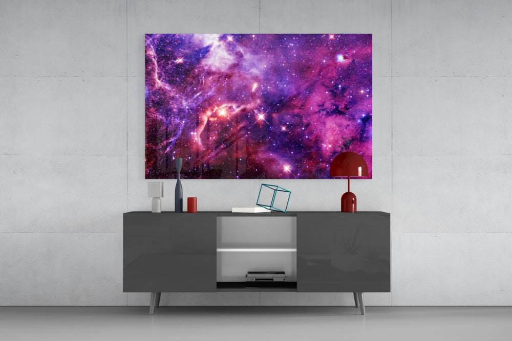 Space Purple glass wall art catching light to reveal its painted nebula