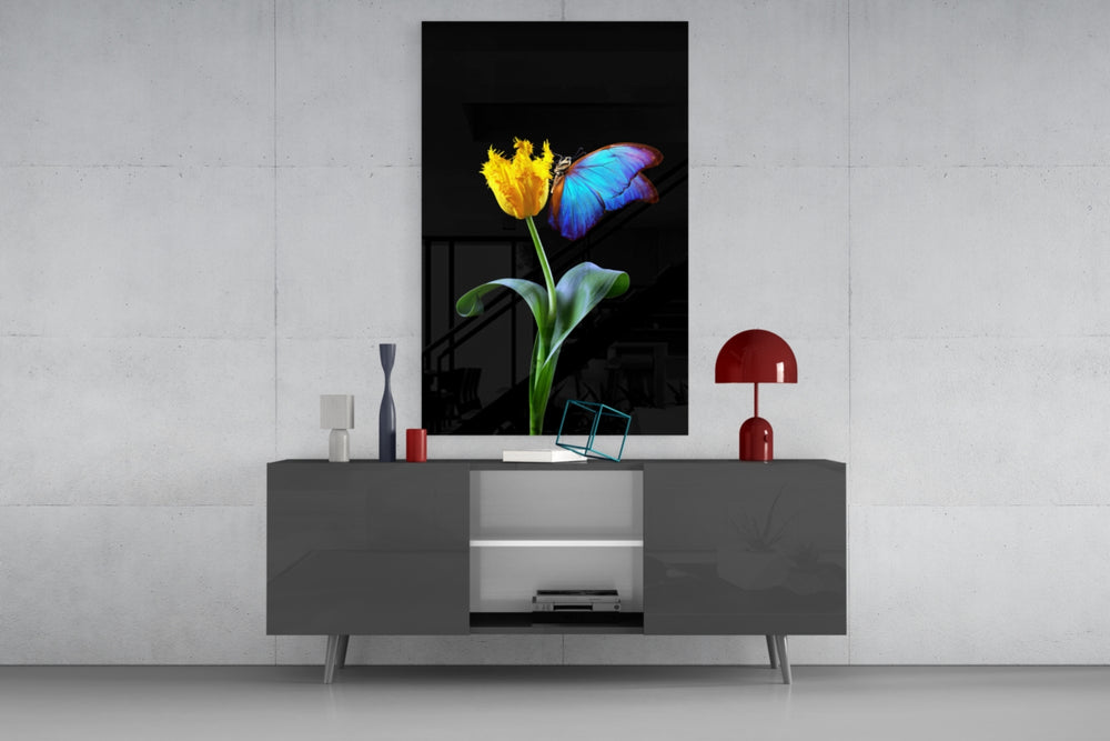 Abstract Art glass wall art catching light to reveal its painted tulip and morpho