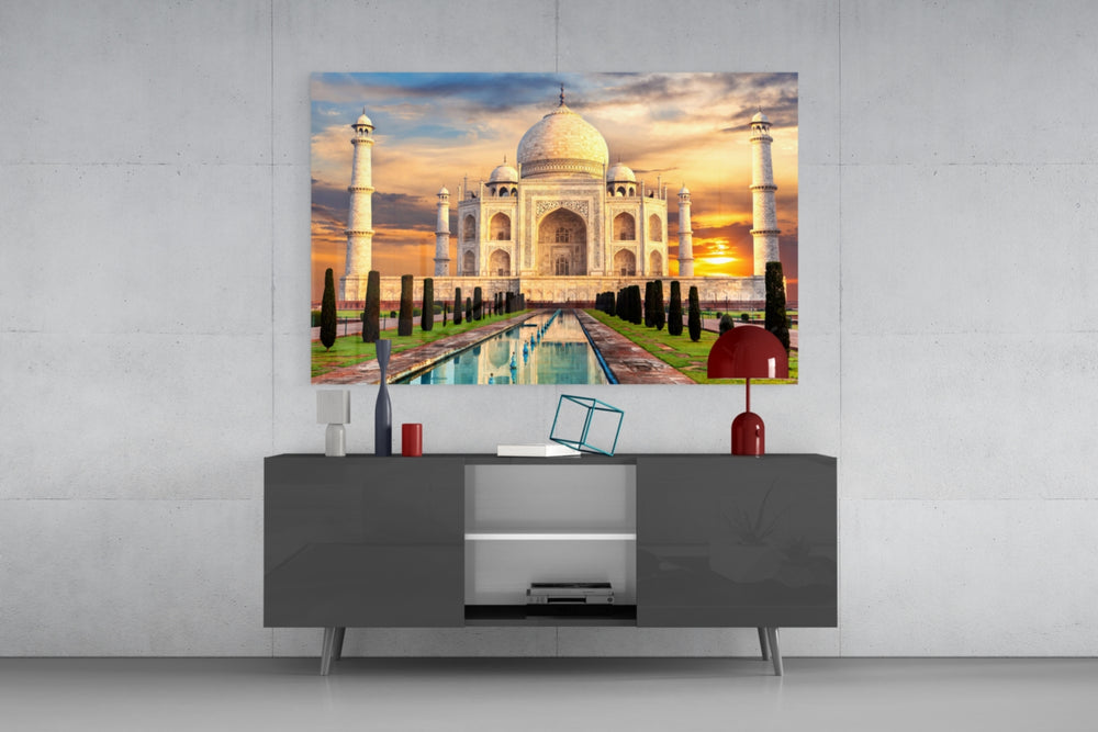 Taj Mahal glass wall art catching light to reveal its painted sunset tones