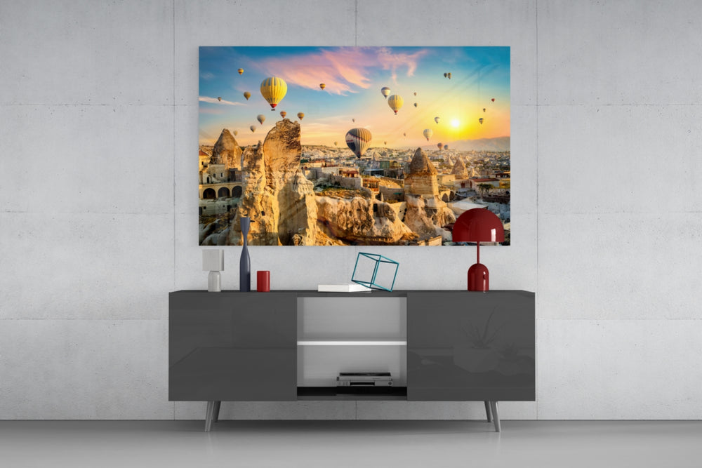 Cappadocia glass wall art catching light to reveal its painted sunrise tones