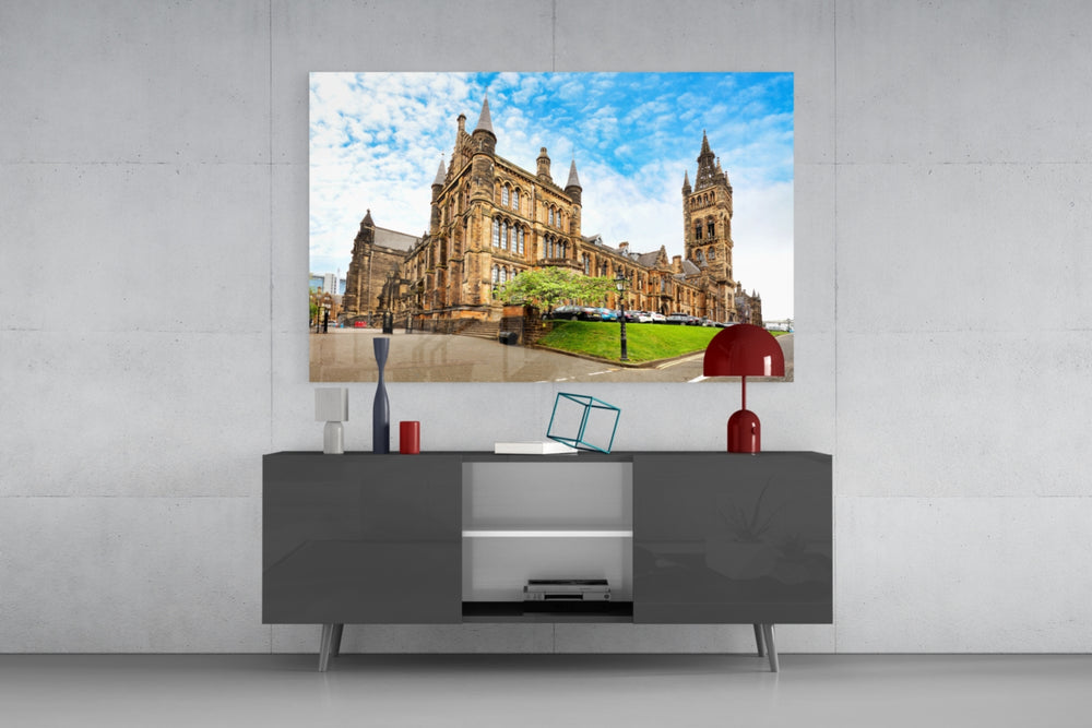 University Of Glasgow glass wall art catching light to reveal its painted sandstone façade