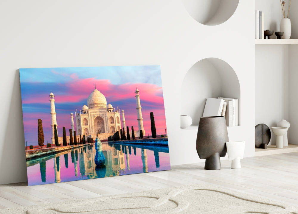 Close-up detail of pink dawn and Taj reflection behind glass