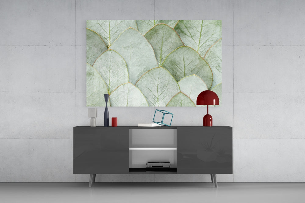 Botanical-poster cinematic glass wall art in Scandi-modern living room