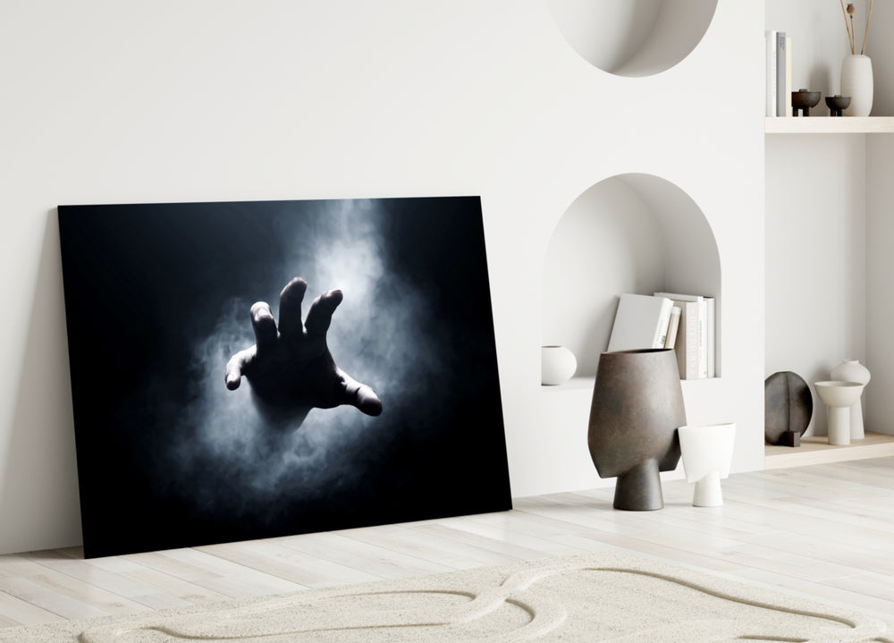 Atmospheric hand-and-fog cinematic glass wall art in designer cinema-room
