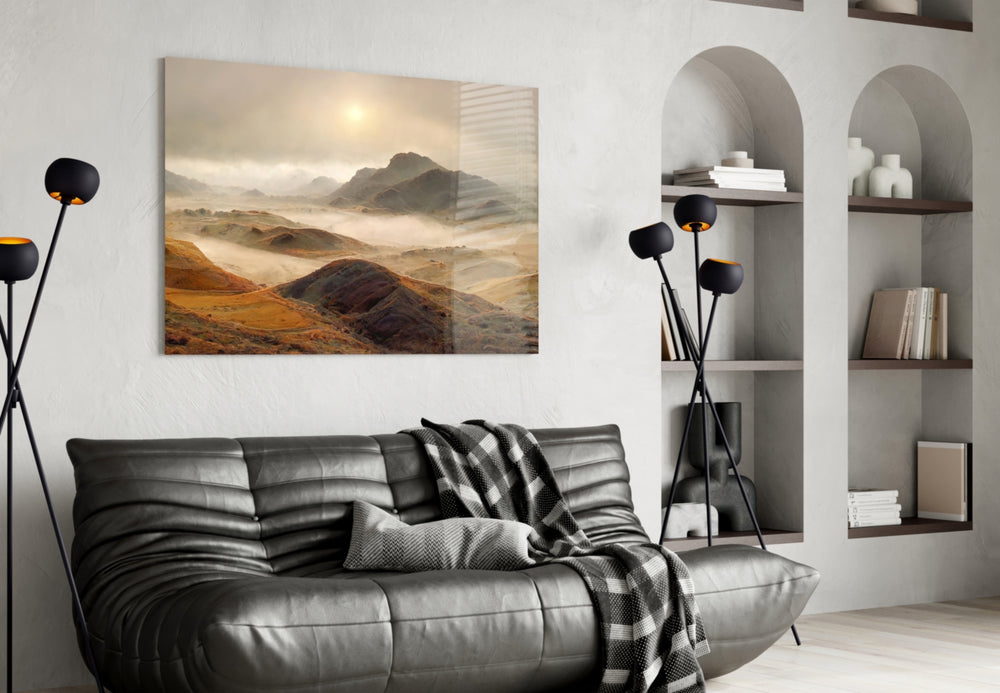 Sepia-amber mountain cinematic glass wall art in hospitality lounge