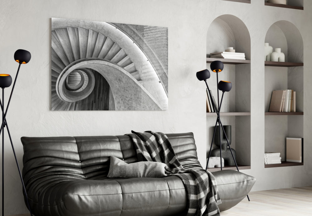 Tadao-Ando-style spiral cinematic glass wall art in heritage stairwell