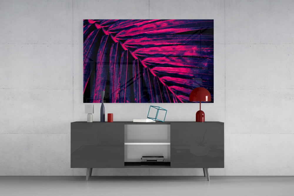 Backlit palm-frond cinematic glass wall art in nightclub-style home bar