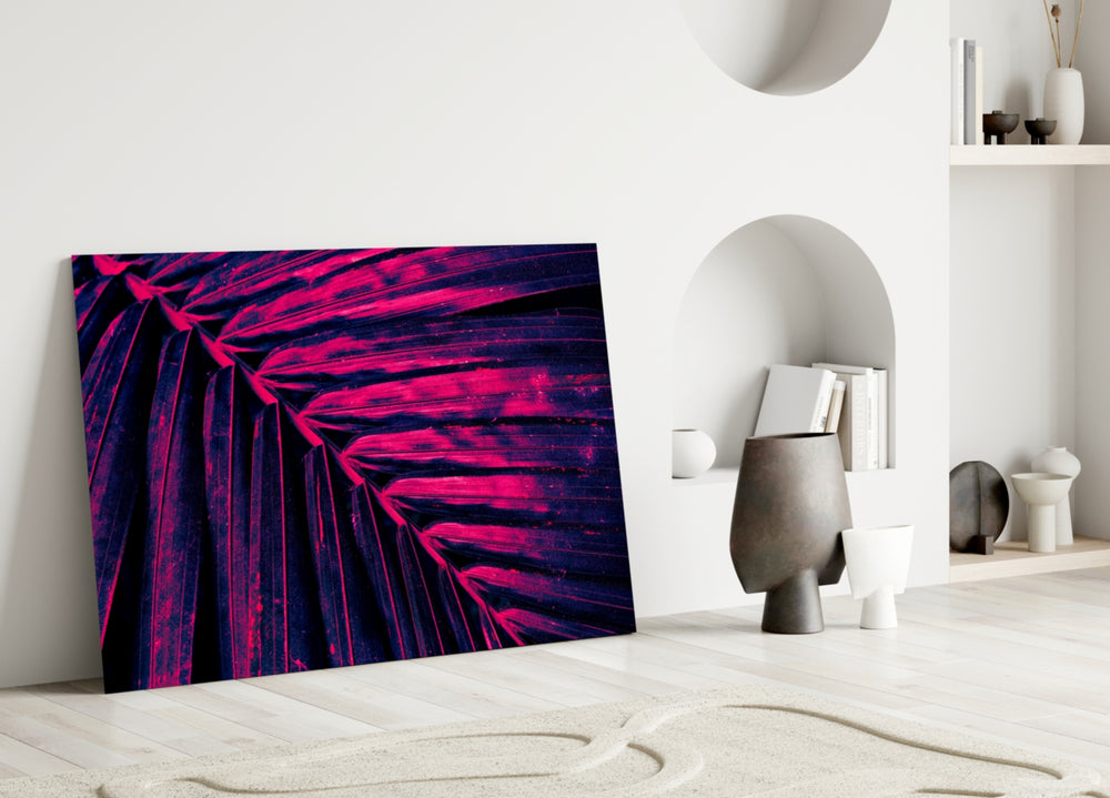 Hot-pink palm cinematic glass wall art in dramatic dining room