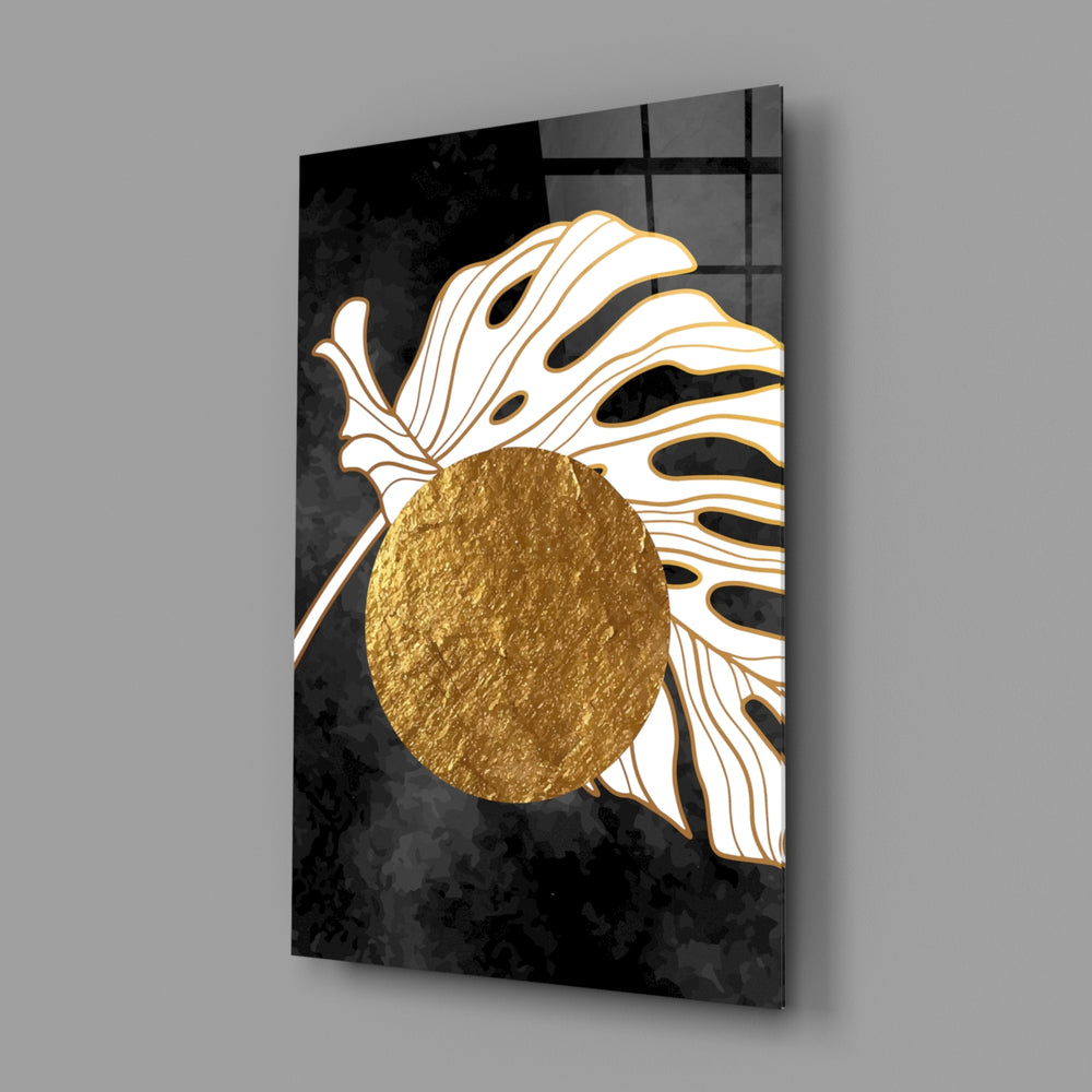 Monstera-and-moon cinematic glass wall art in fashion-atelier entry