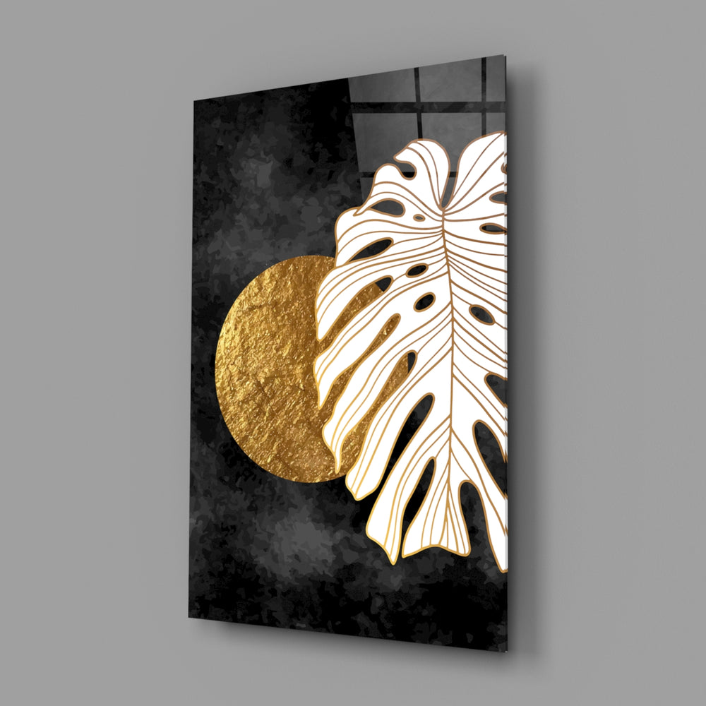 Monstera-and-moon variant cinematic glass wall art in fashion-atelier entry