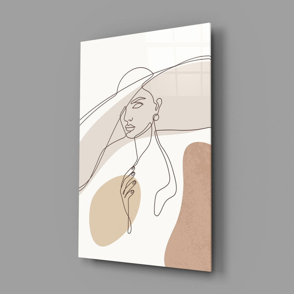 Matisse-style sun-hat cinematic glass wall art in wellness studio reception