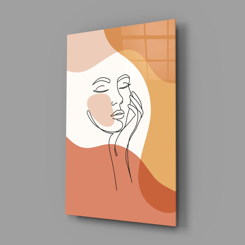 Matisse-style cheek-and-hand cinematic glass wall art in wellness studio reception