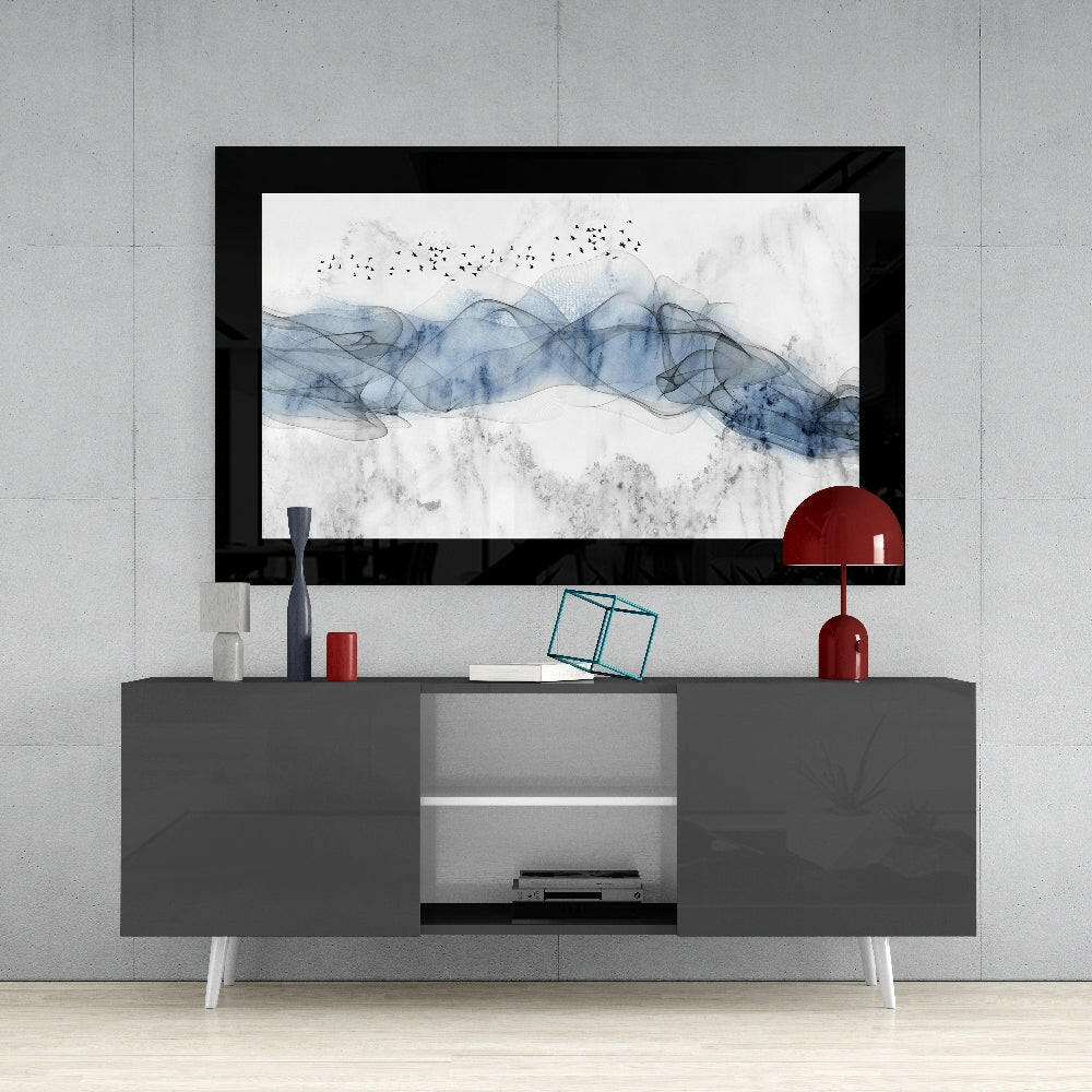 Blue Nebula glass wall art styled above a console in a reading nook