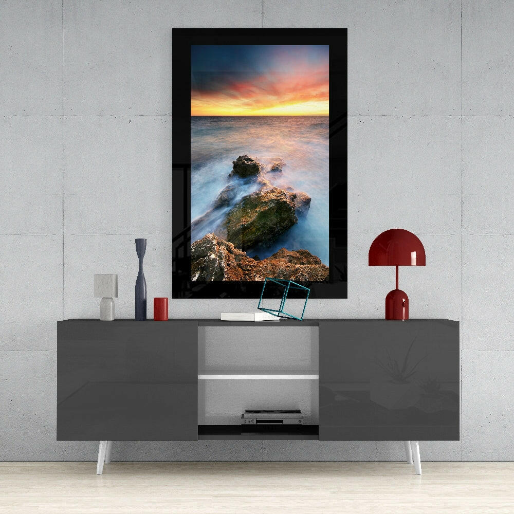 Sunset on the Beach glass wall art styled above a console in a meditation room
