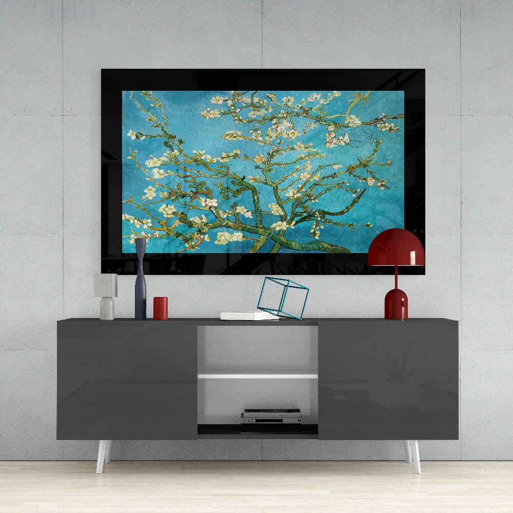 Turquoise Almond Flowers glass wall art styled above a console in a reading nook
