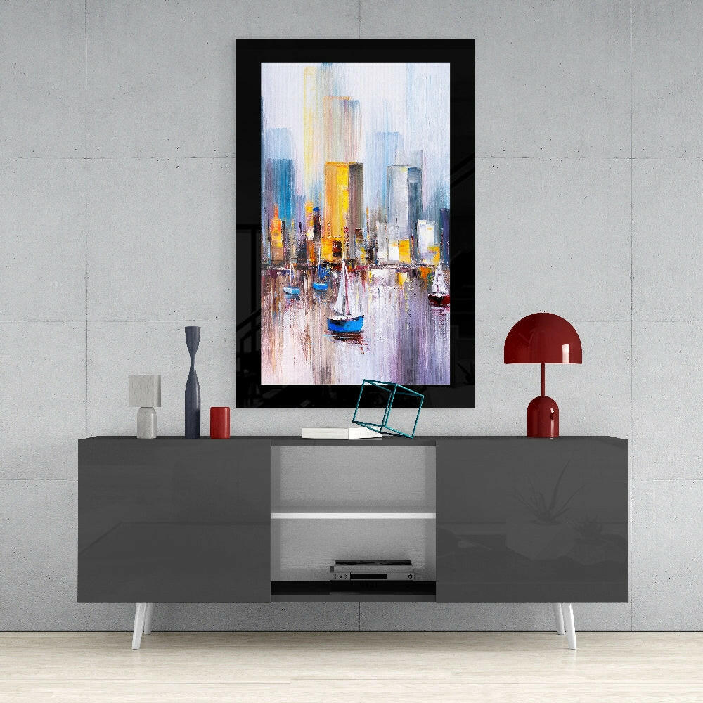 Sailboats glass wall art styled above a console in a reading nook