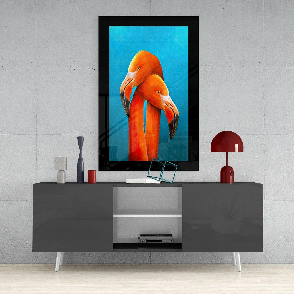 Flamingos glass wall art styled above a vanity in a powder room